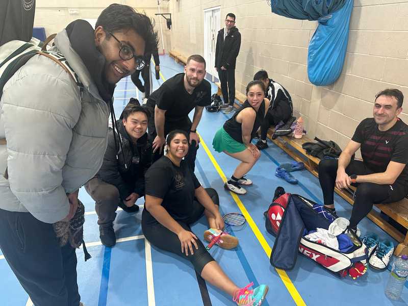Clapham Warriors Badminton Club players goofing around after a session
